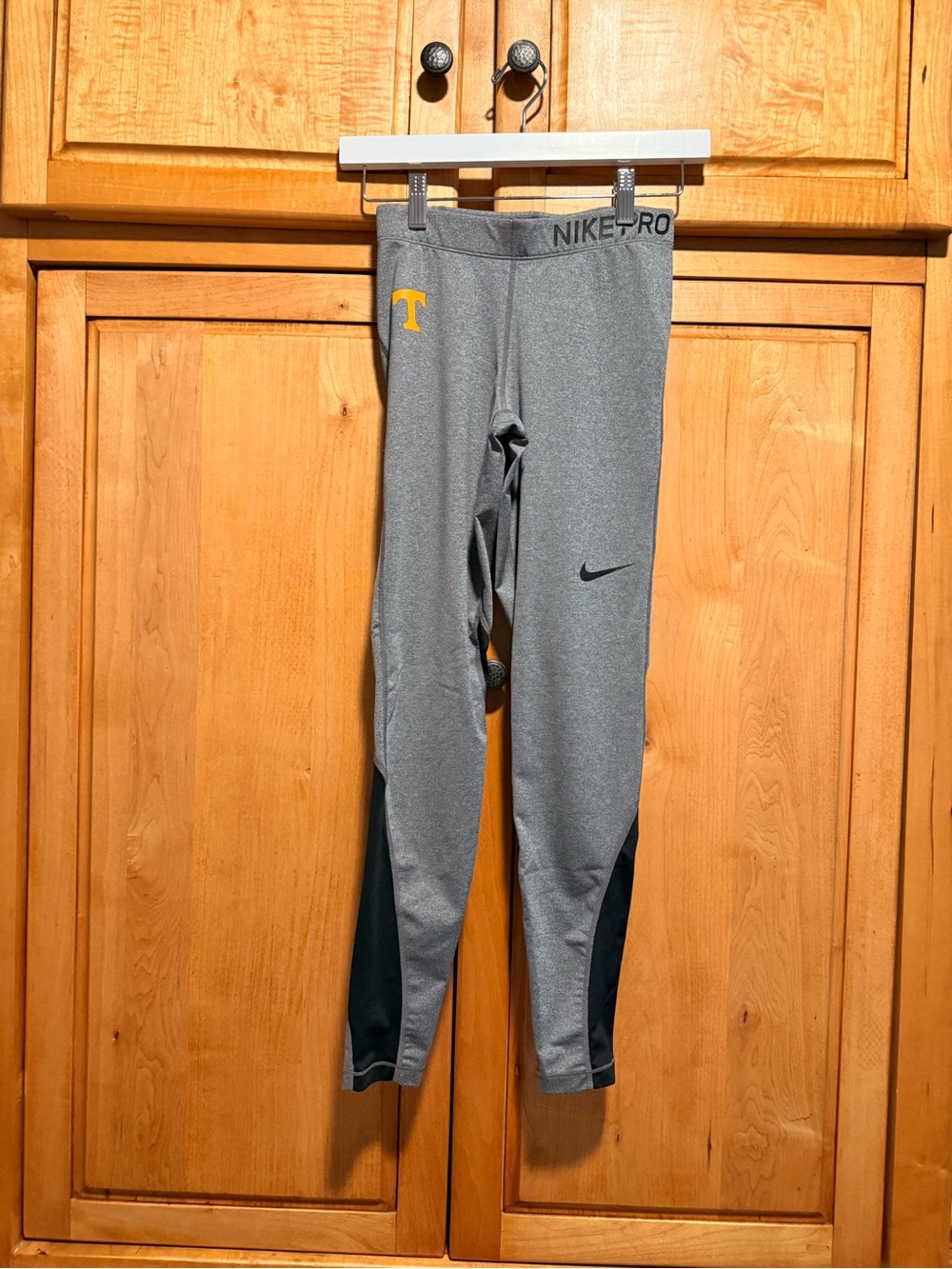 Nike Women’s Gray Leggings with Black Panels and Orange T Accent